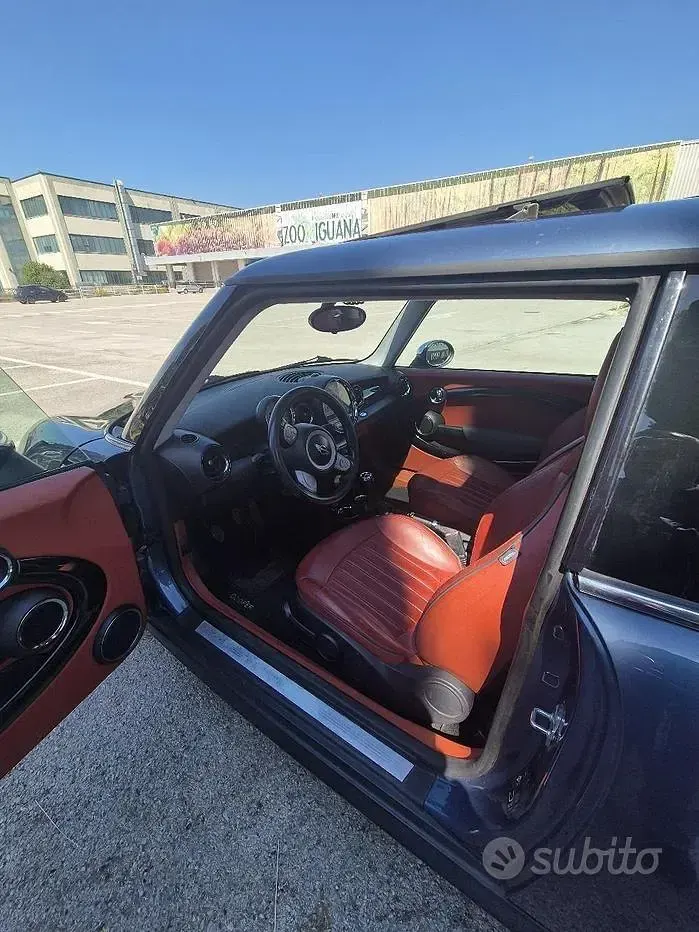 Używany Mini Cooper 109 KM (80 kW) 2009 Niebieski Hatchback