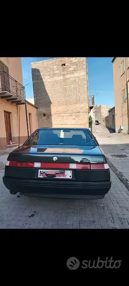 Usata Alfa Romeo 164 145 CV (106 kW) 1989 Verde Berlina