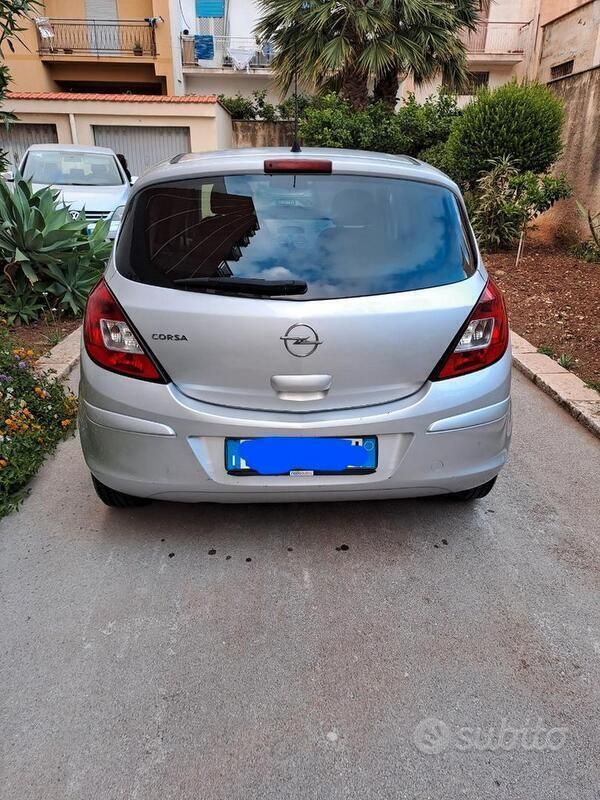 Usata Opel Corsa 80 CV (58 kW) 2010 Grigio Utilitaria