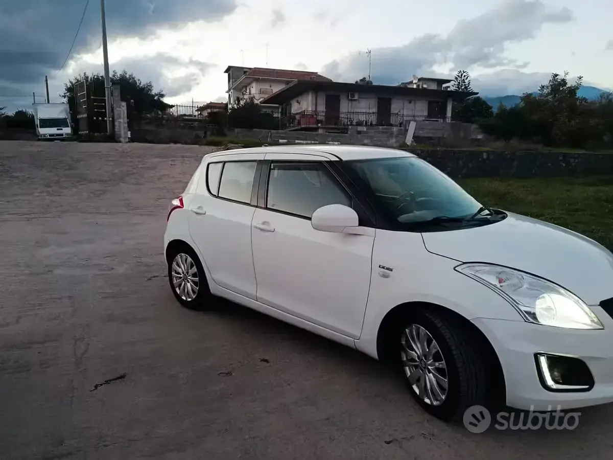 Usata Suzuki Swift 75 CV (55 kW) 2013 Bianco Utilitaria