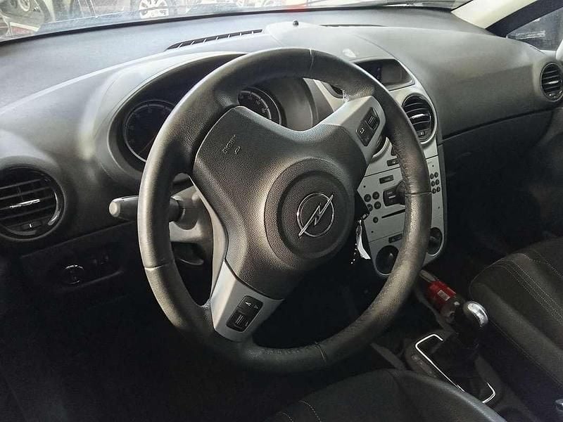 Usata Opel Corsa 54 CV (39 kW) 2012 Grigio Berlina