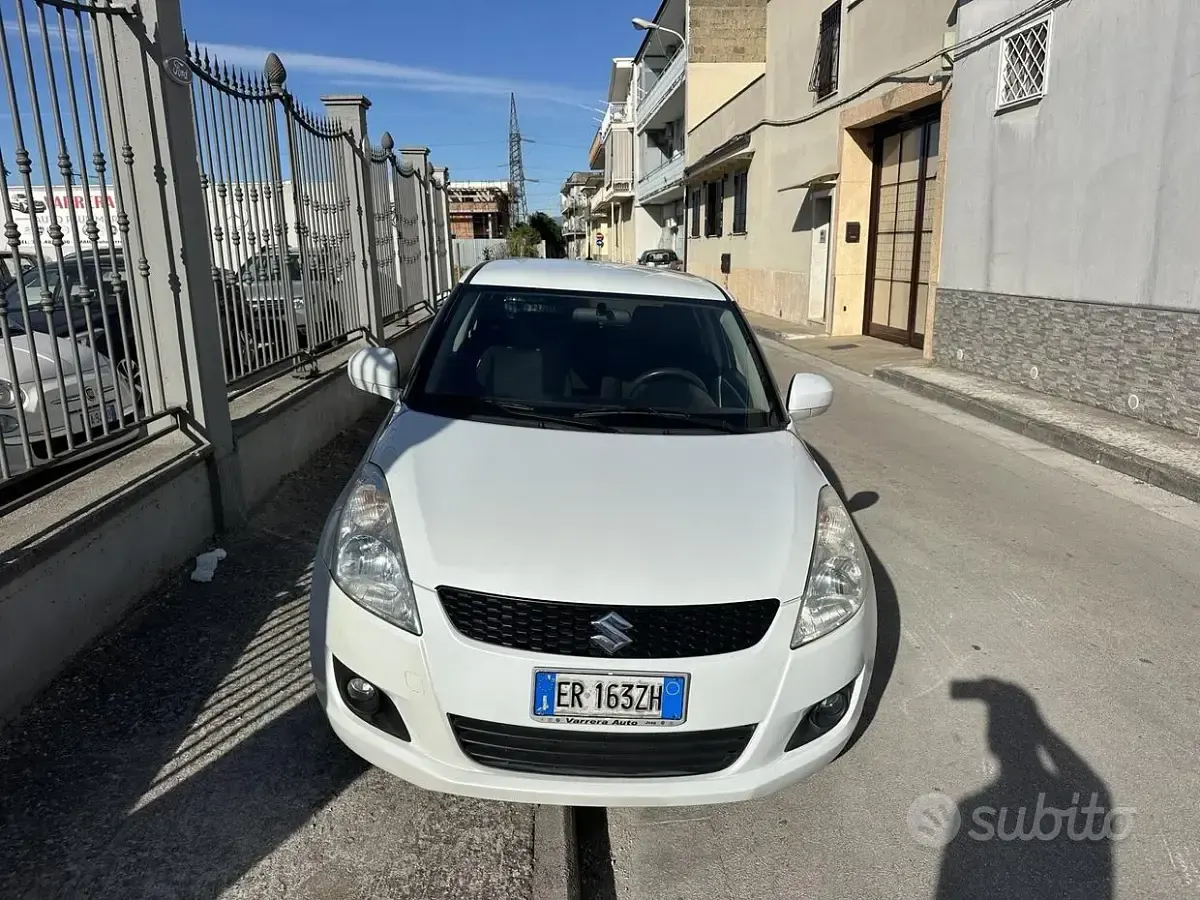 Usata Suzuki Swift 94 CV (69 kW) 2013 Bianco Utilitaria