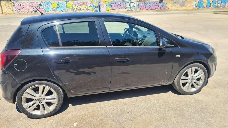 Nero Usata 2013 Opel Corsa Sport Tre volumi | 1700 € (Super prezzo) - Immagine 1/4