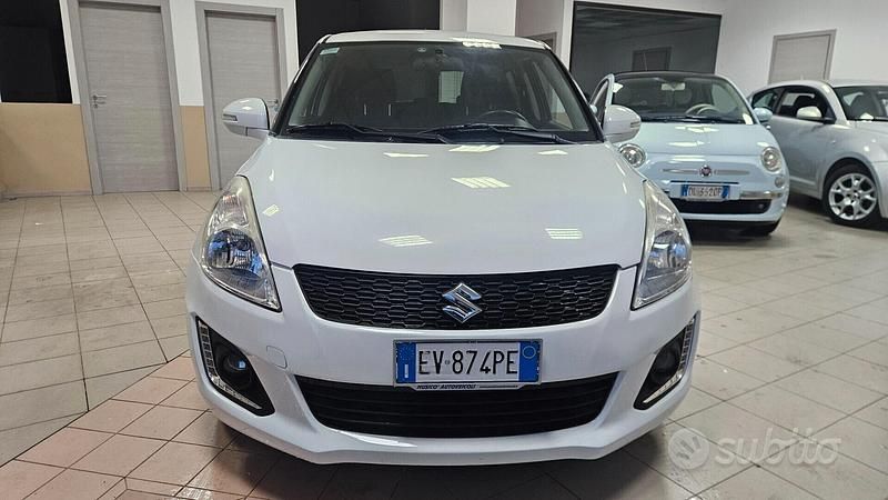 Second-hand Suzuki Swift Cool 75 CP (55 kW) 2014 Alb Hatchback