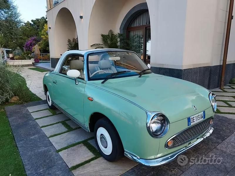 Usata Nissan Figaro 76 CV (55 kW) 1991 Verde Cabrio
