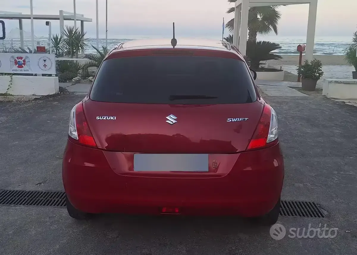 Usata Suzuki Swift 94 CV (69 kW) 2012 Rosso Utilitaria