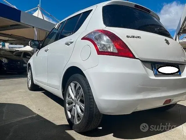 Second-hand Suzuki Swift 94 CP (69 kW) 2014 Alb Hatchback
