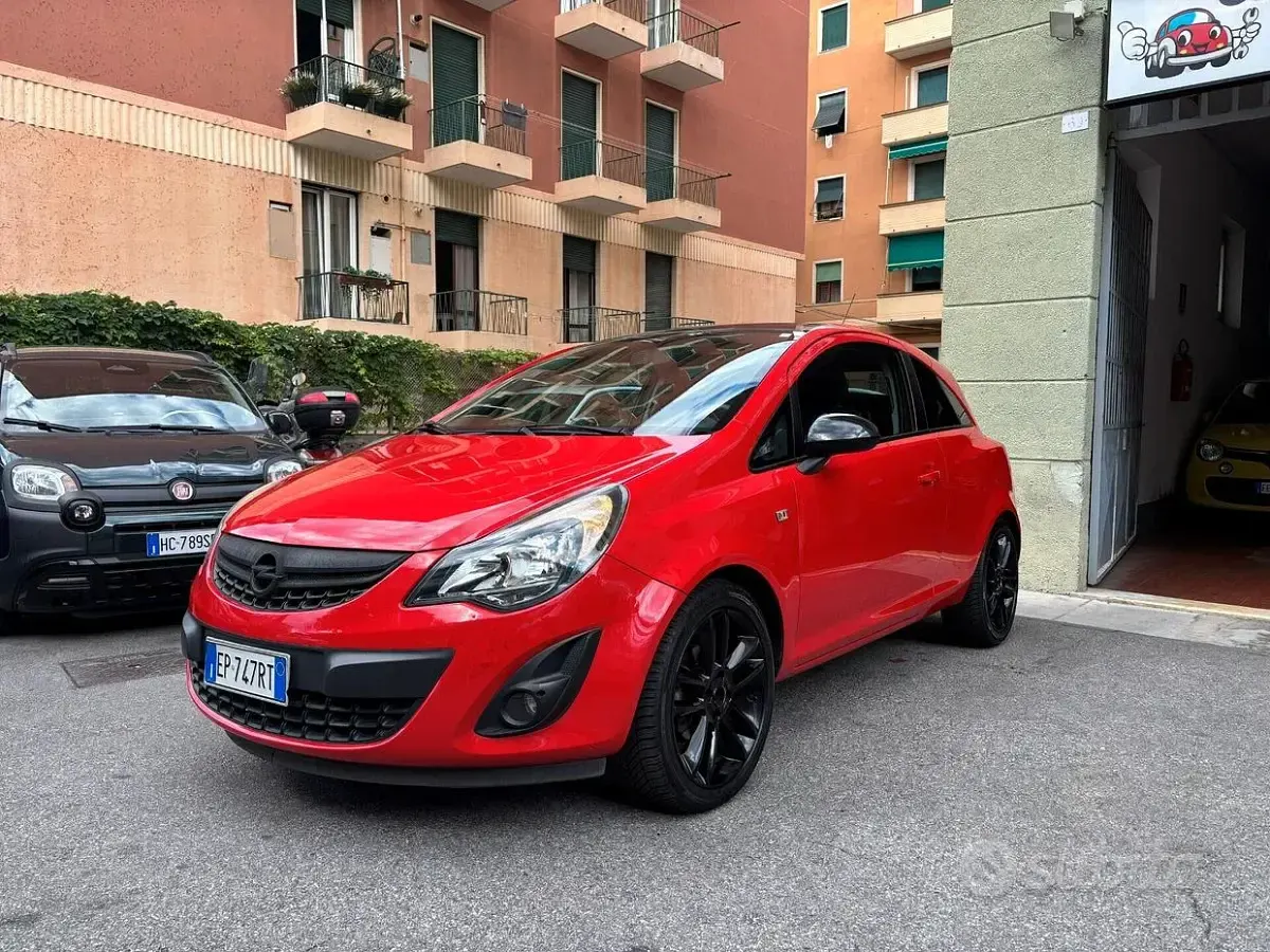 Usata Opel Corsa 101 CV (74 kW) 2013 Rosso Utilitaria