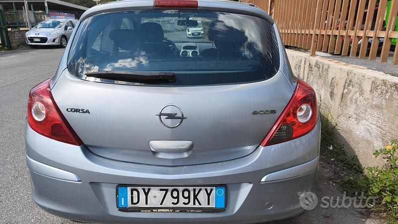 Usata Opel Corsa Sport 75 CV (55 kW) 2009 Grigio Utilitaria