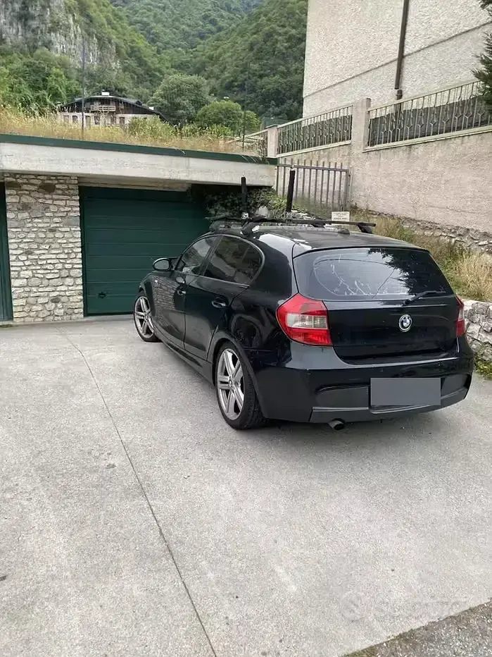 Usata BMW 120 163 CV (119 kW) 2006 Nero Utilitaria