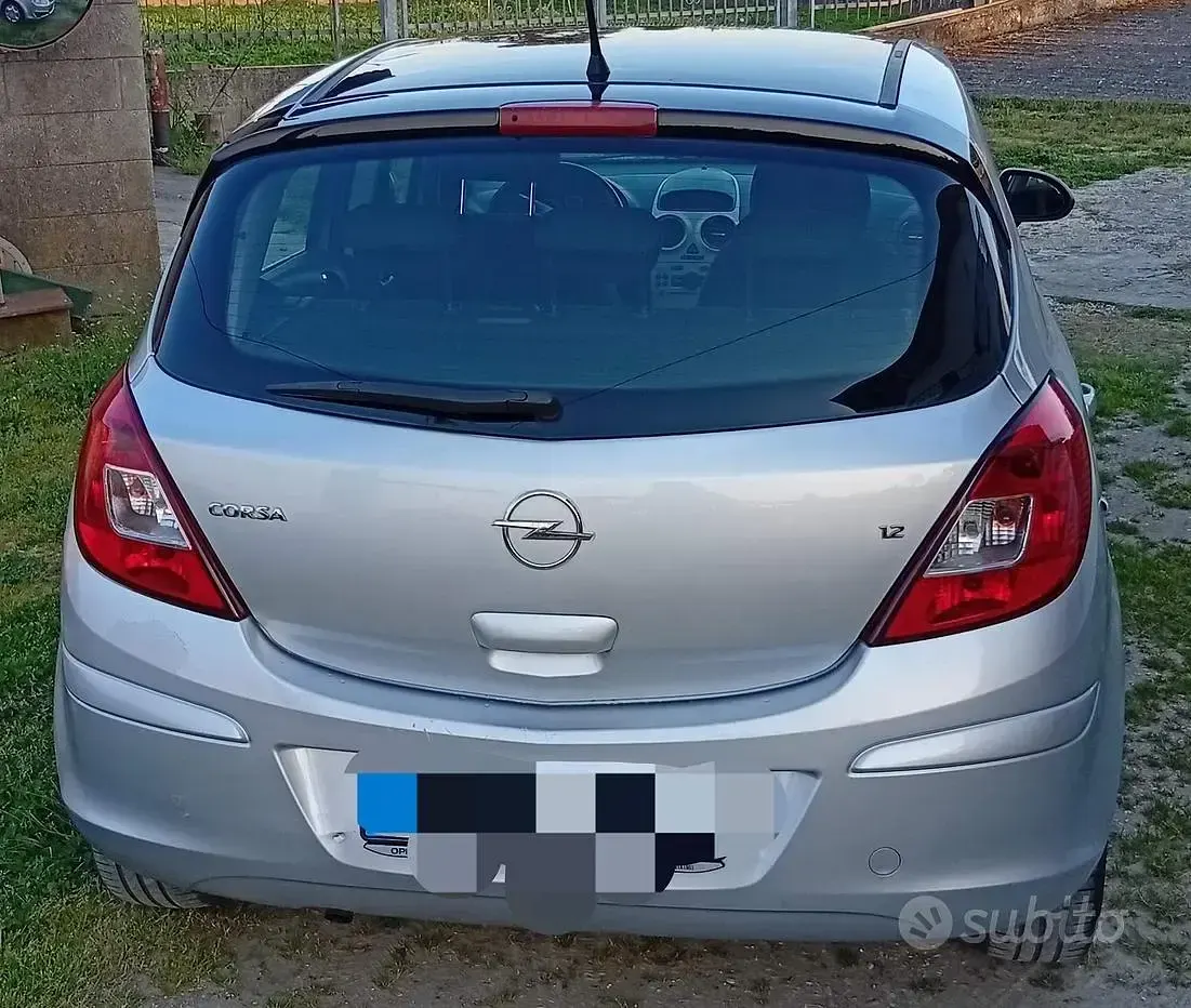 Usata Opel Corsa 65 CV (47 kW) 2009 Grigio Utilitaria