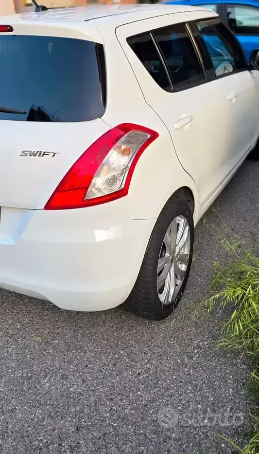 Gebraucht Suzuki Swift 75 PS (55 kW) 2013 Weiß Kleinwagen
