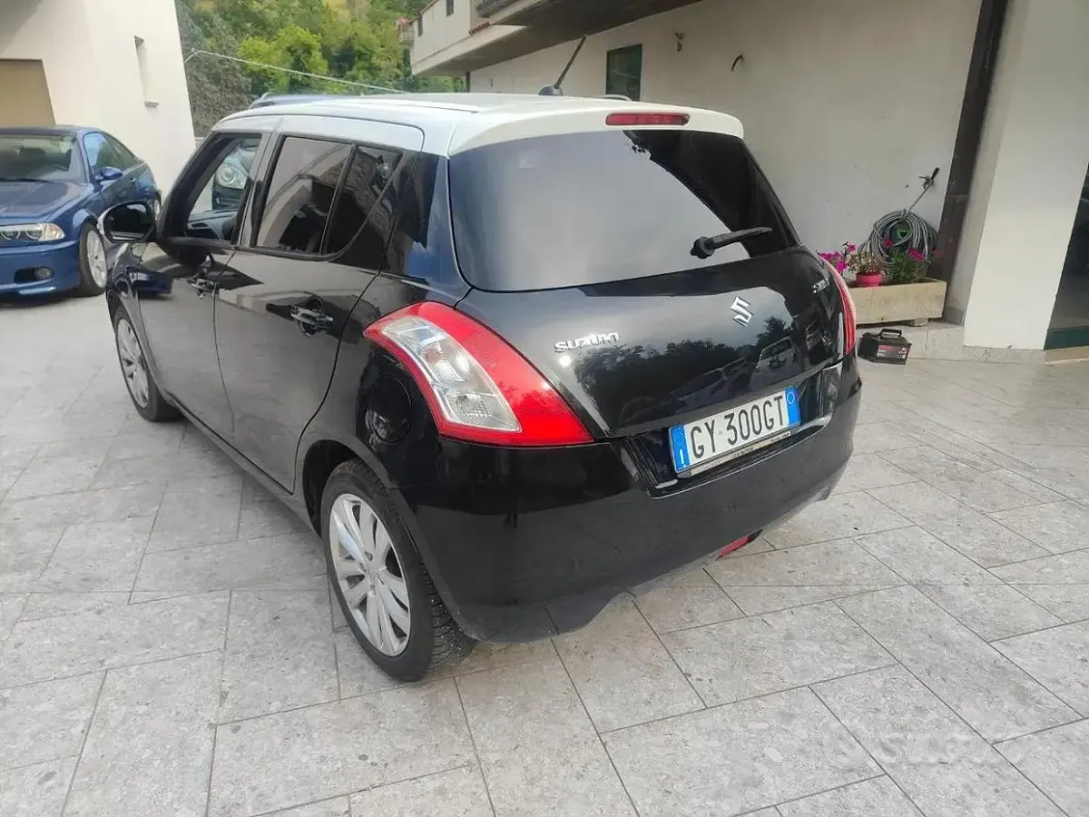 Usata Suzuki Swift Cool 75 CV (55 kW) 2014 Nero Utilitaria