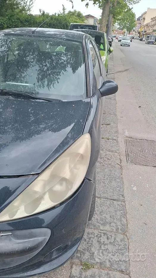 Usata Peugeot 206 60 CV (44 kW) 2010 Nero Berlina