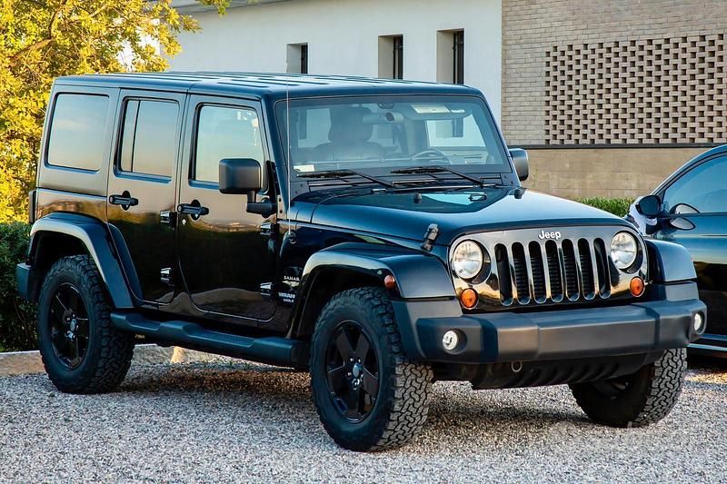 Nero Usata 2011 Jeep Wrangler Unlimited Sahara SUV | 29.500 € (Buon prezzo) - Immagine 1/4