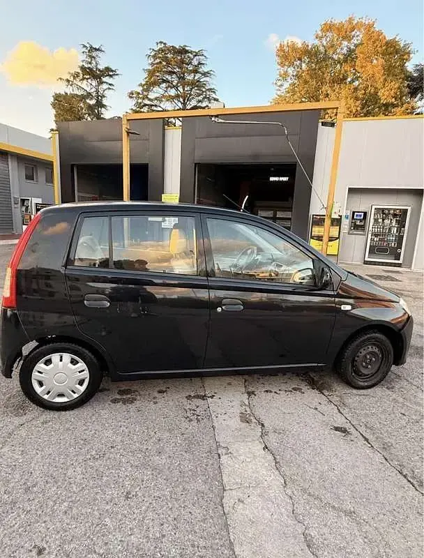Usata Daihatsu Cuore 58 CV (42 kW) 2006 Utilitaria