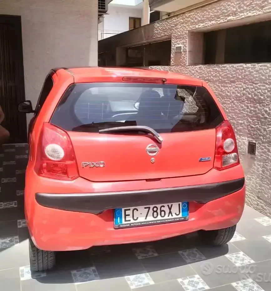 Usata Nissan Pixo 68 CV (50 kW) 2010 Rosso Utilitaria