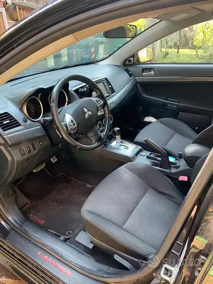 Usata Mitsubishi Lancer 143 CV (105 kW) 2009 Nero Berlina