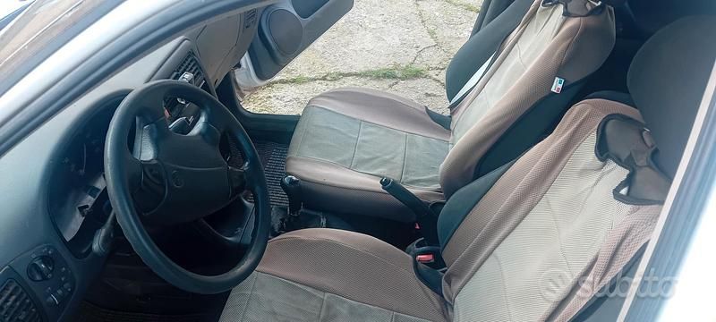 Usata VW Polo Comfortline 64 CV (47 kW) 1999 Bianco Berlina