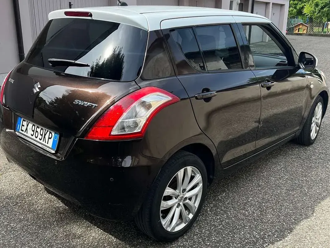 Usata Suzuki Swift Cool 75 CV (55 kW) 2014 Marrone Utilitaria