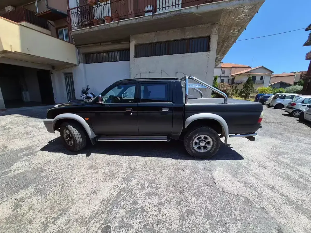 Usata Mitsubishi L200 87 CV (63 kW) 1999 Nero Pick-up