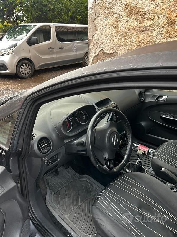 Usata Opel Corsa 80 CV (58 kW) 2010 Grigio Berlina