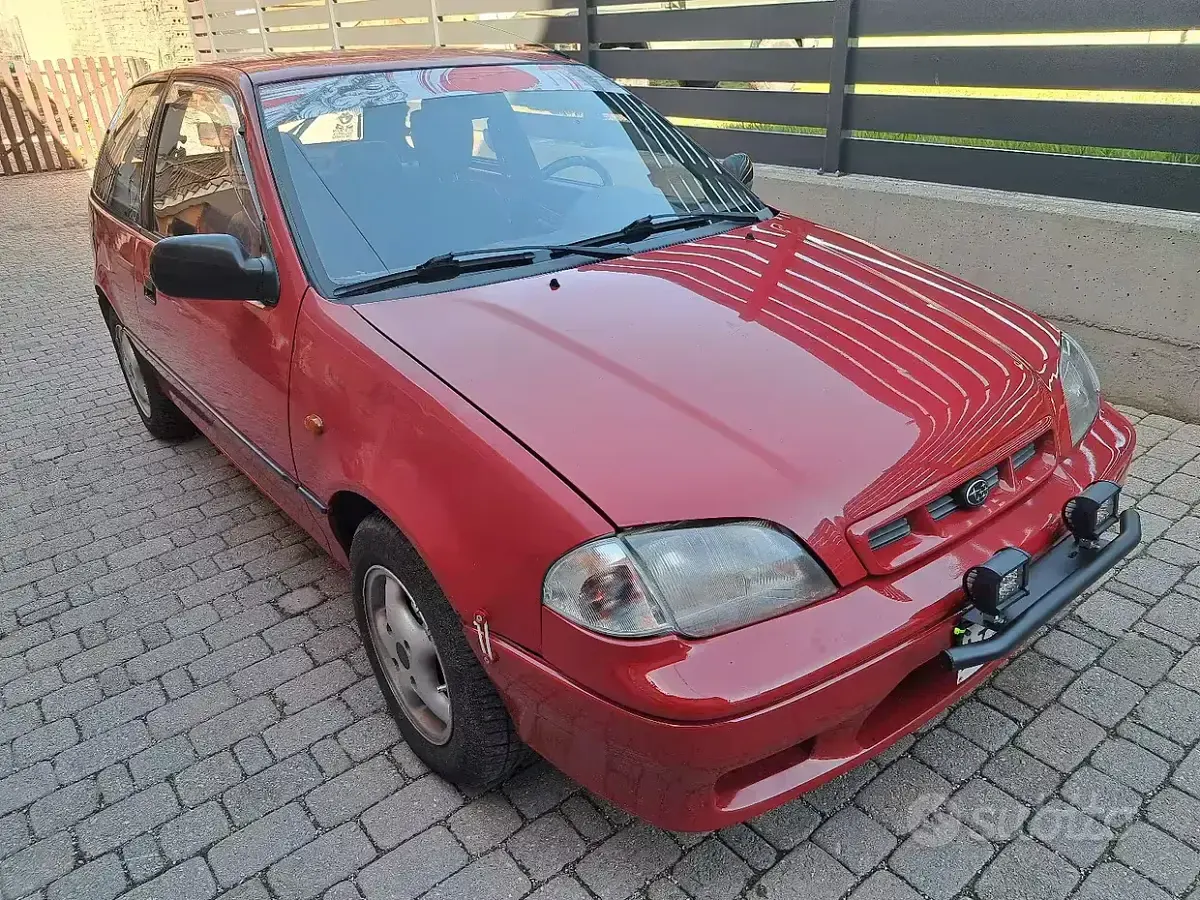 Usata Subaru Justy 68 CV (50 kW) 1997 Rosso Utilitaria