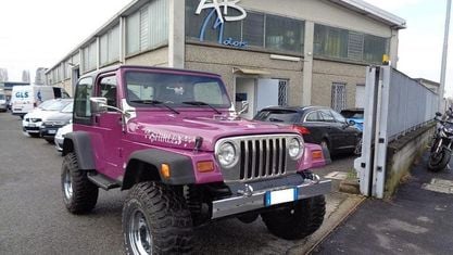 Usado Jeep Wrangler 177 CV (130 kW) 1997 Púrpura SUV