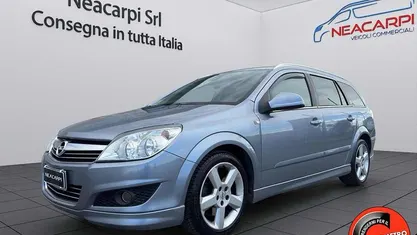 Usata Opel Astra 125 CV (91 kW) 2010 Grigio metallizzato Station wagon