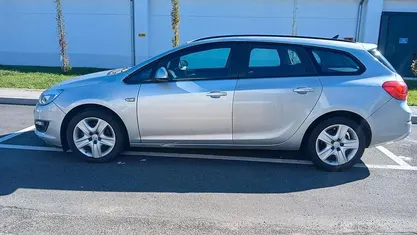 Begagnad Opel Astra 110 HK (80 kW) 2014 Silver Kombi