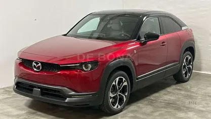 Soul red crystal m: black roof Usata 2024 Mazda MX30 Makoto SUV | 29.990 € (Cara)