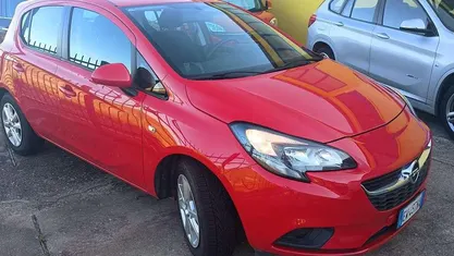 Rosso Usata 2015 Opel Corsa Tre volumi | 7600 € (Buon prezzo)