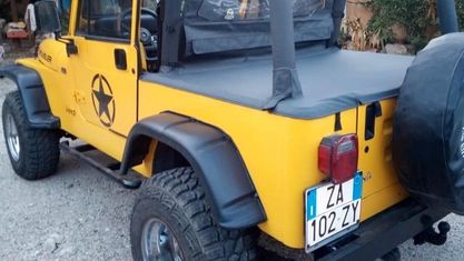 Usata Jeep Wrangler 121 CV (88 kW) 1993 Giallo SUV
