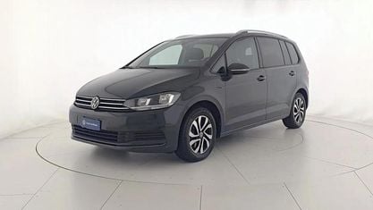 Käytetty VW Touran Business 150 HP (110 kW) 2023 Harmaa Tila-auto