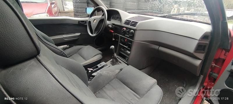 Occasion Alfa Romeo 145 103 ch (75 kW) 1995 Rouge Citadine