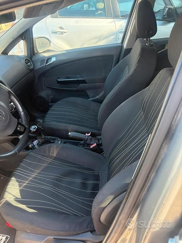 Usata Opel Corsa 85 CV (62 kW) 2010 Grigio Utilitaria