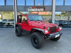 Rosso(met.) Usata 1999 Jeep Wrangler Sport SUV | 24.890 € (Cara)