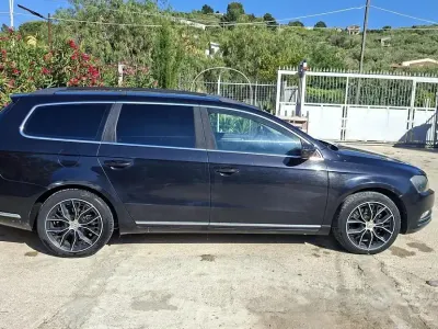 Usata VW Passat 105 CV (77 kW) 2011 Nero Station wagon