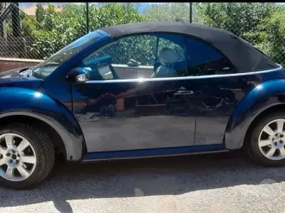Usata VW New Beetle 102 CV (75 kW) 2003 Blu Utilitaria