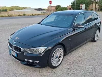 Usata BMW 320 Luxury Line 184 CV (135 kW) 2012 Nero Station wagon