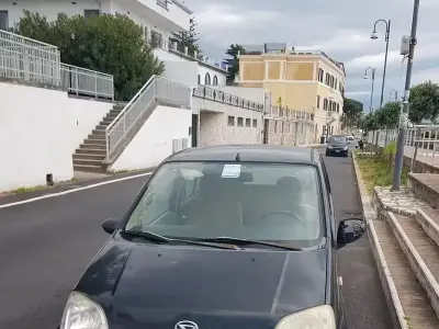 Usata Daihatsu Cuore 58 CV (42 kW) 2006 Nero Utilitaria