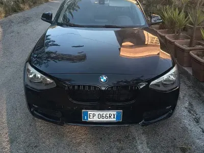 Usata BMW 2000 116 CV (85 kW) 2013 Nero Berlina