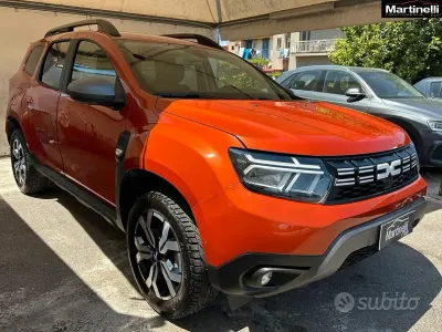 Second-hand Dacia Duster Extreme 101 CP (74 kW) 2023 Portocaliu SUV