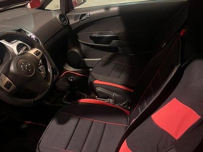 Usata Opel Corsa 85 CV (62 kW) 2012 Rosso Utilitaria