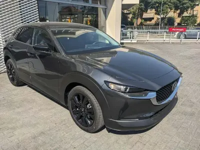 Nuova Mazda CX-30 140 CV (102 kW) 2026 Machine grey SUV