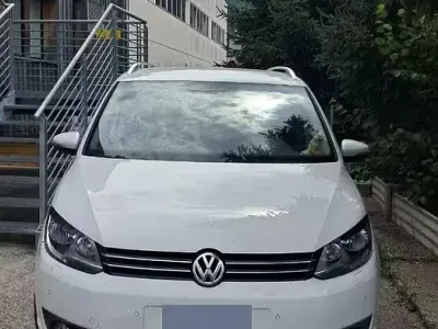 Usata VW Touran 105 CV (77 kW) 2014 Bianco Monovolume