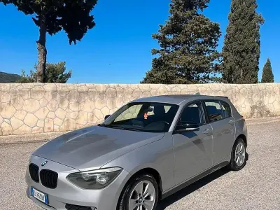 Usata BMW 116 116 CV (85 kW) 2012 Grigio Utilitaria