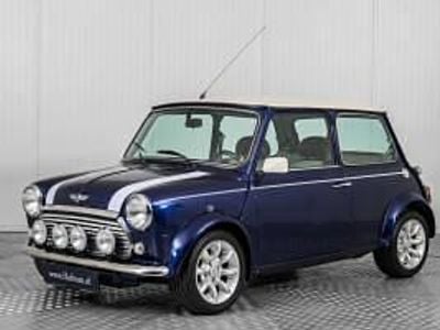 Begagnad Mini Cooper 63 HK (46 kW) 1999 Blå Halvkombi