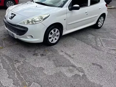 Usata Peugeot 206 57 CV (41 kW) 2012 Bianco Berlina