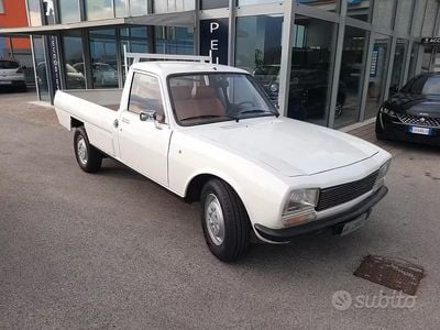 Begagnad Peugeot 504 89 HK (65 kW) 1989 Beige Pickup